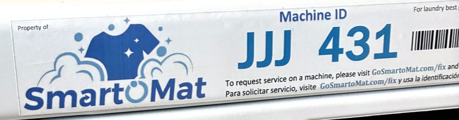 Smart-O-Mat Machine ID sticker — three letters and three digits, e.g. JJJ 431